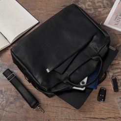 Torba męska skóra ekologiczna na dokumenty A4 laptopa czarna Beltimore M04. Czarne torby na laptopa męskie bez wzorów, ze skóry ekologicznej. Za 197.99 zł.