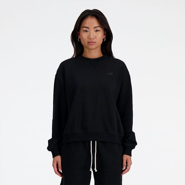 Bluza damska New Balance WT41500BK – czarna. Czarne bluzy damskie New Balance, s, bez wzorów, z bawełny, bez kaptura. Za 359.99 zł.