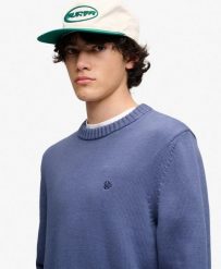 Superdry Sweter Preppy z bawełny – relaxed fit. Niebieskie swetry przez głowę męskie Superdry., s, z aplikacjami, z bawełny, bez kołnierzyka. Za 330.60 zł.