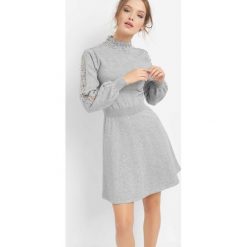 Dzianinowa sukienka z ażurem. Sukienki damskie marki Orsay. Za 139.99 zł.
