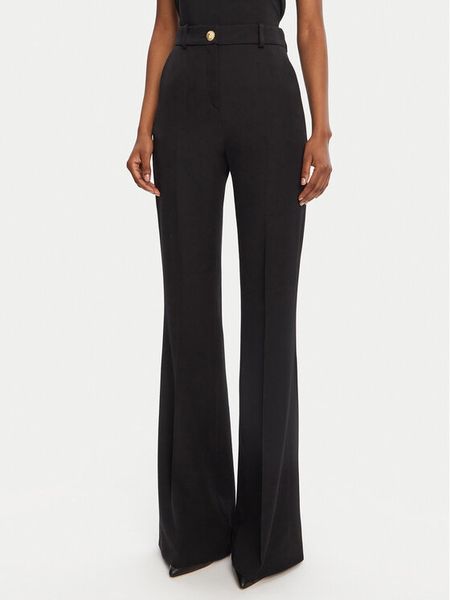 Balmain Spodnie materiałowe DF1PO104WC09 Czarny Regular Fit. Czarne spodnie materiałowe damskie Balmain, bez wzorów, z materiału. Za 3,759.00 zł.