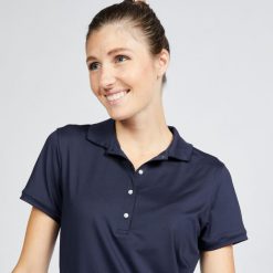 Koszulka polo do golfa damska z krótkim rękawem Inesis WW500. Niebieskie koszulki sportowe damskie INESIS, bez wzorów, z dżerseju, na golfa. Za 89.99 zł.