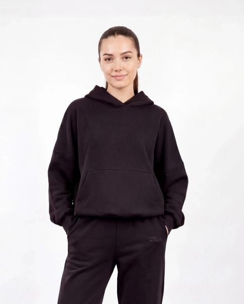 Damska bluza oversize UNLEASH WINGS BLACK. Czarne bluzy damskie Wings, uniwersalny, bez wzorów, z materiału, bez kaptura. Za 249.90 zł.