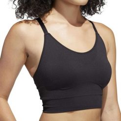 Biustonosz sportowy damski Adidas Seamless. Czarne obuwie sportowe damskie Adidas, bez wzorów, na fitness i siłownię. Za 102.00 zł.