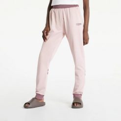 SPODNIE DAMSKIE ELLESSE SPORTOWE DRESOWE XS. Czerwone spodnie dresowe damskie Ellesse, uniwersalny, bez wzorów, z bawełny. Za 195.69 zł.