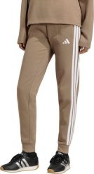 Adidas Spodnie damskie Essentials 3-Stripes Fleece Slim beżowe KF8317 XS. Brązowe spodnie sportowe damskie Adidas, xs, bez wzorów. Za 236.51 zł.