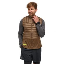 Kamizelka puchowa L.I.M Intense Trail Down Vest. Brązowe kurtki męskie Haglöfs, l, bez wzorów, z puchu, sportowe, bez kaptura. Za 1,190.00 zł.