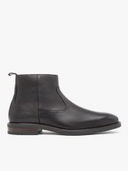Ciemnobrązowe botki ze skóry licowej. Brązowe botki męskie Ryłko, bez wzorów, ze skóry, eleganckie, przed kolano, bez zapięcia. Za 599.99 zł.