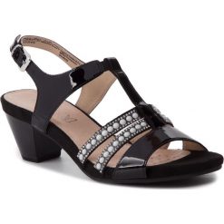 Sandały CAPRICE - 9-28310-22 Black Patent 018. Czarne klapki damskie Caprice, z aplikacjami, z lakierowanej skóry, bez obcasa, na obcasie, bez zapięcia. W wyprzedaży za 219.00 zł.
