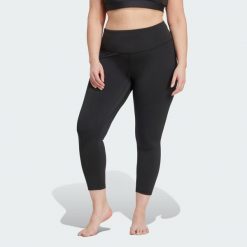 Legginsy All Me 7/8 (Plus Size). Czarne legginsy damskie Adidas, plus size, bez wzorów, z materiału. Za 279.00 zł.