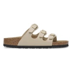 Klapki damskie BIRKENSTOCK Florida BF Sandcastle. Brązowe klapki damskie Birkenstock, bez wzorów, z materiału, eleganckie, bez obcasa. Za 319.99 zł.