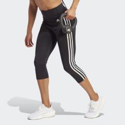 Damskie legginsy z wysoką talią adidas Designed To Move 3-Bandes 3/4 Sport. Białe legginsy damskie Adidas, xl, bez wzorów, z elastanu, krótkie, do biegania. Za 189.30 zł.