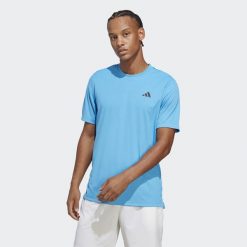 Club Tennis Tee. Niebieskie koszulki sportowe męskie Adidas, s, bez wzorów, z materiału, bez kołnierzyka, bez ramiączek, tenisowe. Za 152.95 zł.