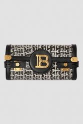 BALMAIN Czarno-biała torebka B-buzz Pouch 23-cuir Emb Pb. Białe kopertówki damskie Balmain, bez wzorów, ze skóry, bez dodatków. W wyprzedaży za 4,799.99 zł.