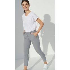 Eleganckie spodnie w kratę. Szorty damskie marki Greenpoint. Za 139.99 zł.