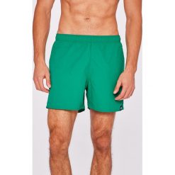 Adidas Performance - Szorty. Różowe krótkie spodenki sportowe męskie adidas Performance, z materiału. W wyprzedaży za 89.90 zł.