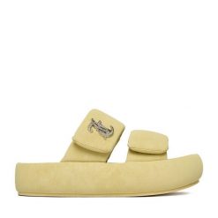 Klapki Juicy Couture. Żółte klapki damskie Juicy Couture, bez wzorów, bez obcasa. Za 249.99 zł.