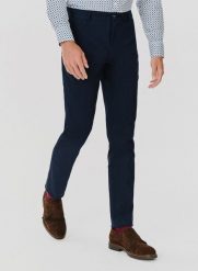 PAKO LORENTE – Granatowe spodnie męskie. Spodnie materiałowe męskie Pako Lorente, l, bez wzorów, z bawełny, casualowe. Za 129.99 zł.