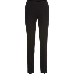 Spodnie Loose Fit bonprix czarny. Spodnie materiałowe damskie marki DOMYOS. Za 89.99 zł.