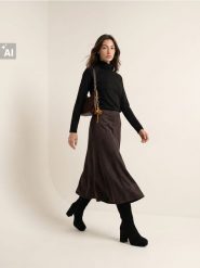Bawełniana bluzka z golfem i raglanowymi rękawami - czarny. Czarne bluzki damskie Sinsay, l, bez wzorów, z bawełny, bez kołnierzyka, bez ramiączek. Za 29.99 zł.