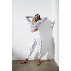 Top do jogi Moonholi Total Eclipse z długim rękawem. Szare koszulki sportowe damskie MOONHOLI, l, bez wzorów, sportowe, bez kołnierzyka. Za 329.00 zł.