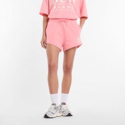 Spodenki damskie New Balance WB61Y80AAA6 – różowe. Czerwone szorty sportowe damskie New Balance, l, bez wzorów, z bawełny, klasyczne. Za 199.99 zł.