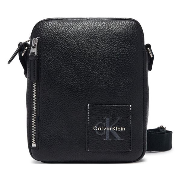 Saszetka Calvin Klein. Czarne saszetki męskie Calvin Klein, młodzieżowe, małe. Za 347.99 zł.