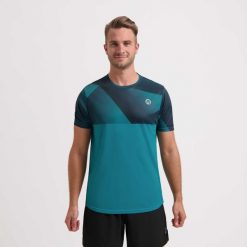 Koszulka do biegania RUSH. Niebieskie koszulki sportowe męskie Rogelli, m, bez wzorów, bez kołnierzyka, bez ramiączek, do biegania. W wyprzedaży za 74.00 zł.