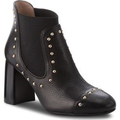 Botki UNISA - Olite Sty Black Softy. Czarne kozaki damskie Unisa, ze skóry, bez obcasa. W wyprzedaży za 399.00 zł.