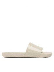Calvin Klein Klapki Pool Slide Rubber HM0HM01062 Beżowy. Brązowe klapki męskie Calvin Klein, z tworzywa sztucznego. Za 209.99 zł.