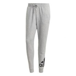 Spodnie dla dorosłych Adidas Essentials French Terry Szary. Czarne spodnie sportowe męskie Adidas, m, bez wzorów, z bawełny, na fitness i siłownię. Za 234.75 zł.