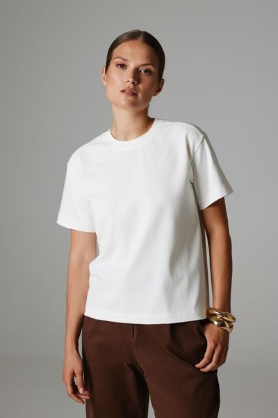 T-SHIRT KIM ECRU XS - Flawless. T-shirty damskie Flawless, uniwersalny, bez wzorów, z bawełny, klasyczne, bez kołnierzyka. Za 219.00 zł.