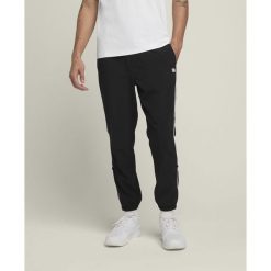 Spodnie tenisowe męskie Wilson Team. Czarne spodnie sportowe męskie Wilson, m, bez wzorów, tenisowe. W wyprzedaży za 148.90 zł.