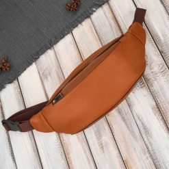 Saszetka nerka męska skórzana na pas koniakowa skóra naturalna Abruzzo ABR-51-CG. Czarne saszetki męskie z nylonu, klasyczne. Za 84.00 zł.