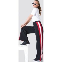 Trendyol Spodnie z paskami i guzikami - Black. Spodnie materiałowe damskie marki Trendyol. Za 80.95 zł.