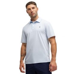Męska techniczna golfowa koszulka polo Siroko Birkdale Blue. Niebieskie koszulki polo męskie SIROKO, m, bez wzorów, z tkaniny, sportowe, bez ramiączek. Za 211.00 zł.