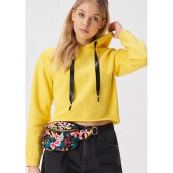 Gładka bluza z kapturem - Żółty. Żółte bluzy damskie Sinsay, l, bez wzorów, z kapturem. Za 39.99 zł.