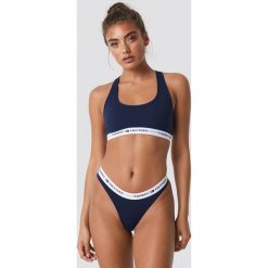 Tommy Hilfiger Stringi Cotton Iconic - Blue,Navy. Niebieskie stringi damskie Tommy Hilfiger. Za 80.95 zł.