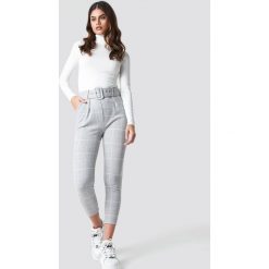 Trendyol Spodnie w kratkę - Grey. Szare spodnie materiałowe damskie Trendyol, w kratkę. Za 100.95 zł.