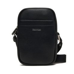 Saszetka Calvin Klein. Czarne saszetki męskie Calvin Klein, młodzieżowe, małe. Za 289.99 zł.