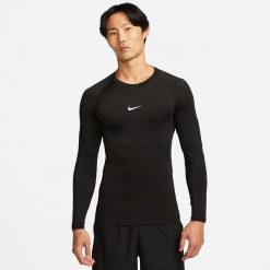Nike Koszulka Termoaktywna treningowa Nike Pro Longsleeve czarna FB7919-010 długi rękaw XL. Czarne koszulki sportowe męskie Nike, m, bez wzorów, bez kołnierzyka, bez ramiączek. Za 176.67 zł.
