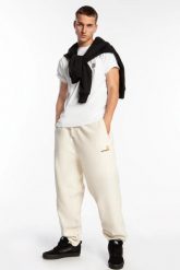 Spodnie Męskie Carhartt WIP American Script Jogging Pant Natural BEŻOWE. Brązowe spodnie sportowe męskie Carhartt, m, bez wzorów, z bawełny, do biegania. Za 419.00 zł.