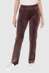JUICY COUTURE Brązowe spodnie dresowe z weluru. Brązowe spodnie dresowe damskie Juicy Couture, s, bez wzorów, z dresówki. W wyprzedaży za 299.99 zł.