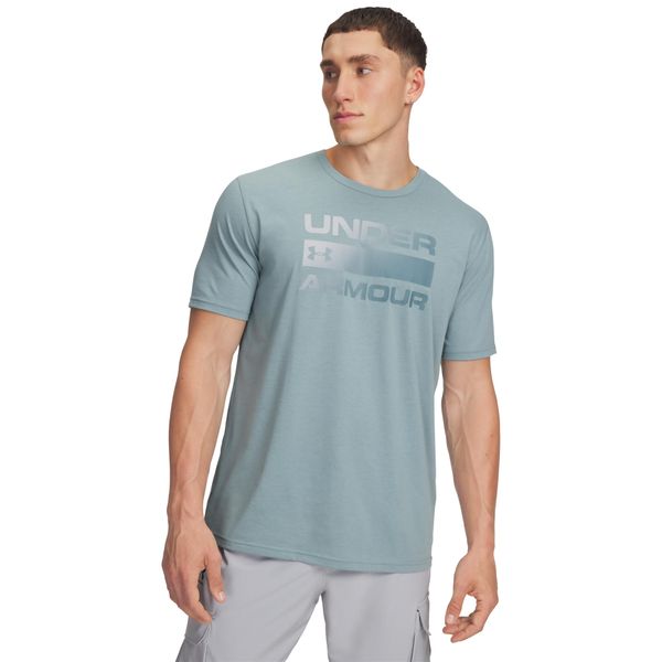 Koszulka Under Armour Team Issue. Niebieskie buty sportowe męskie Under Armour, s, bez wzorów, z bawełny, bez kołnierzyka, bez ramiączek, na fitness i siłownię. Za 146.65 zł.