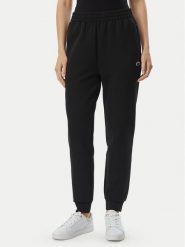 Lacoste Spodnie dresowe XF0189 Czarny Regular Fit. Czarne spodnie dresowe damskie Lacoste, bez wzorów, z dresówki. Za 504.99 zł.