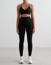 Damskie legginsy wysoki stan, odprowadzające pot, squat proof Sense Tall czarne. Czarne legginsy damskie Aim'n, l, bez wzorów, z elastanu. Za 301.00 zł.