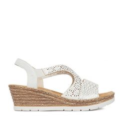 Sandały Rieker. Białe sandały damskie Rieker, bez wzorów, bez obcasa, na koturnie, bez zapięcia. Za 319.99 zł.