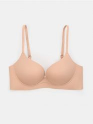 Biustonosz push-up bez fiszbin - kremowy. Białe biustonosze Sinsay, bez wzorów. Za 29.99 zł.