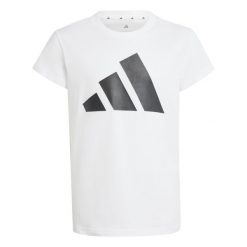 Koszulka dla dziewczynki adidas Essentials. Białe bluzki dla dziewczynek Adidas, bez wzorów, z bawełny, bez kołnierzyka, bez ramiączek. Za 99.05 zł.