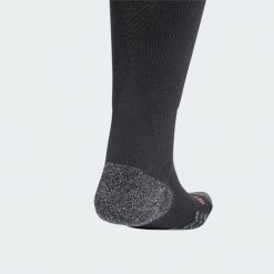 Getry FC Bayern 24/25 Away. Czarne legginsy sportowe męskie Adidas, bez wzorów, z materiału, do piłki nożnej. Za 109.00 zł.
